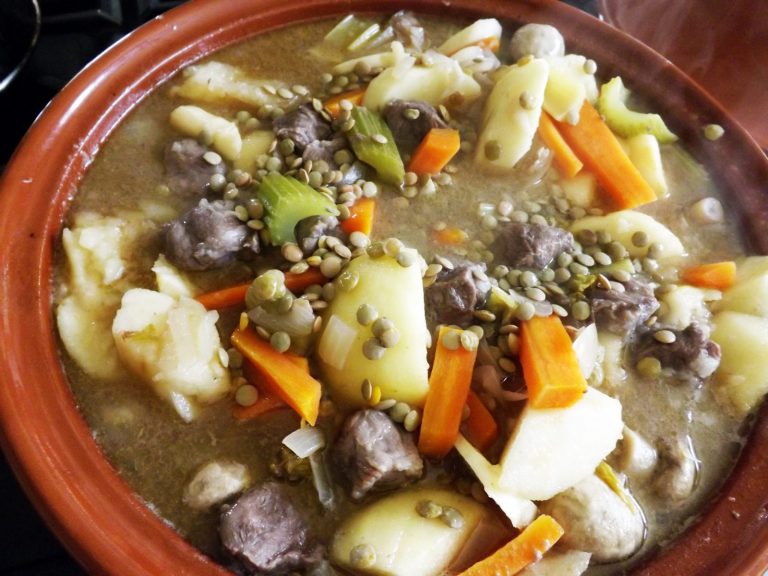 Stew with potato, lentils, meat, carrot and swede